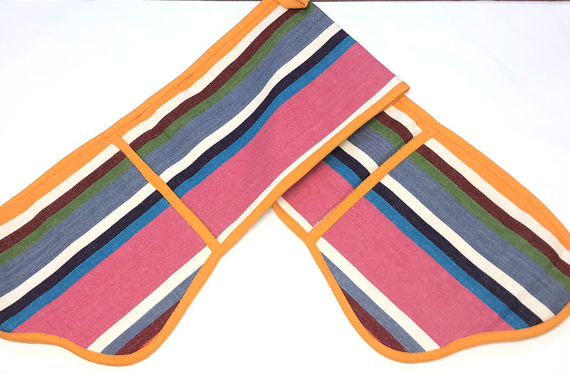 Tangerine, pink, blue and brown stripey oven gloves